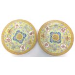 Two yellow ground Chinese porcelain plates with good luck symbols, late 19th century, 22cm diam (2)