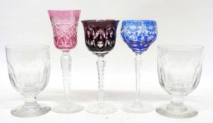 Pair of heavy glass rummers with three further coloured glass wine glasses (5)
