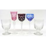 Pair of heavy glass rummers with three further coloured glass wine glasses (5)