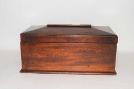 19th century mahogany tea caddy of sarcophagus form, hinged lid opening to a three compartment
