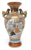 Japanese Satsuma vase with decoration of pavilions and Mt Fuji in the background with lion