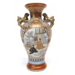 Japanese Satsuma vase with decoration of pavilions and Mt Fuji in the background with lion