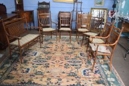 Suite of late 19th/early 20th century Arts & Crafts style chairs comprising two carvers, four single