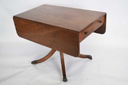 19th century mahogany pedestal Pembroke table with frieze drawer over a turned column and a quatre