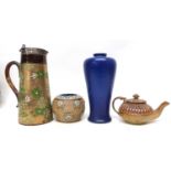 Group of English art pottery including Doulton jug with silver rim, Pilkington vase, Doulton match