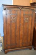 Late 19th/early 20th century Arts & Crafts style oak wardrobe carved with Gothic type decoration and