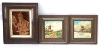 Group of three framed tiles, two with Dutch scenes, indistinctly signed, and further larger tile
