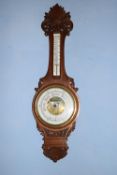 G Shaw, Bedford, late 19th century oak cased aneroid barometer and thermometer combination, the case