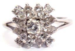 Diamond cluster ring, a design with three tiers of single cut diamonds raised in a basket mount