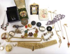 Box of costume jewellery to include necklaces, brooches etc