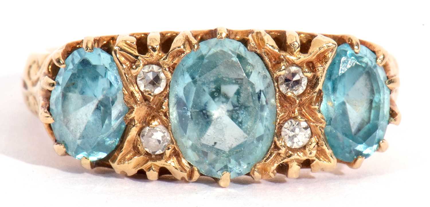 Aquamarine and diamond ring featuring three graduated oval shaped aquamarines, highlighted between - Image 2 of 10