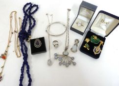 Quantity of costume jewellery to include large designed white metal and moonstone pendant on a 925