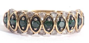 Modern 9ct gold green tourmaline and diamond ring, having 9 small tourmalines highlighted between