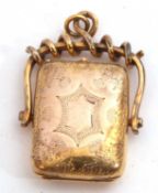 Victorian gold plated swivel locket of rectangular shape, engraved with a monogram to the front,