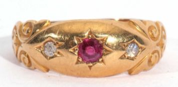 Victorian 18ct gold ruby and diamond three stone ring, centring a small round cut ruby between two