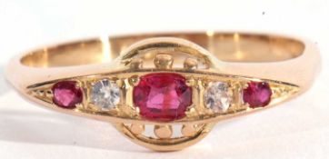 Ruby and diamond ring, line set with three small graduated rubies highlighted between with two small