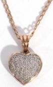 9ct gold and diamond heart pendant, the heart shaped pendant decorated throughout with small