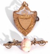 Mixed Lot: 9ct gold brooch pendant of shield shape, chased and engraved around an engraved