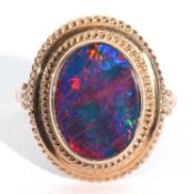 Yellow metal doublet opal ring, the flat centre opal bezel set an raised in a rope twist design