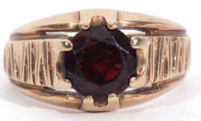 9ct gold garnet set signet ring, the round cut faceted garnet 9.26mm diam, multi-claw set and raised