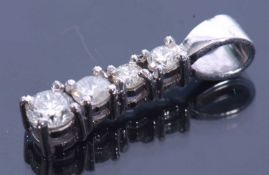 Modern diamond pendant featuring four graduated small brilliant cut diamonds, 0.30ct approx, all