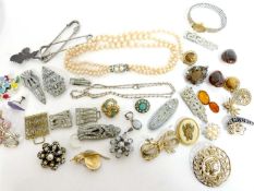 Shoe box of various costume jewellery to include brooches, earrings etc