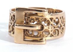 9ct gold pierced buckle ring, the wide band overall pierced with scrolls and having a large buckle