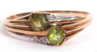 Modern 9ct gold peridot and small diamond designer ring featuring two opposite hexagonal cut