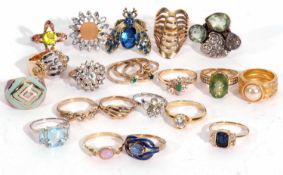 Ring pad containing 20 various costume rings to include a 9ct gold paste cluster ring, three 925