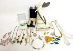 Quantity of costume jewellery to include necklaces, brooches etc