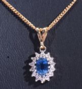 Modern sapphire and diamond pendant stamped 375, suspended from a 375 and 9k marked chain
