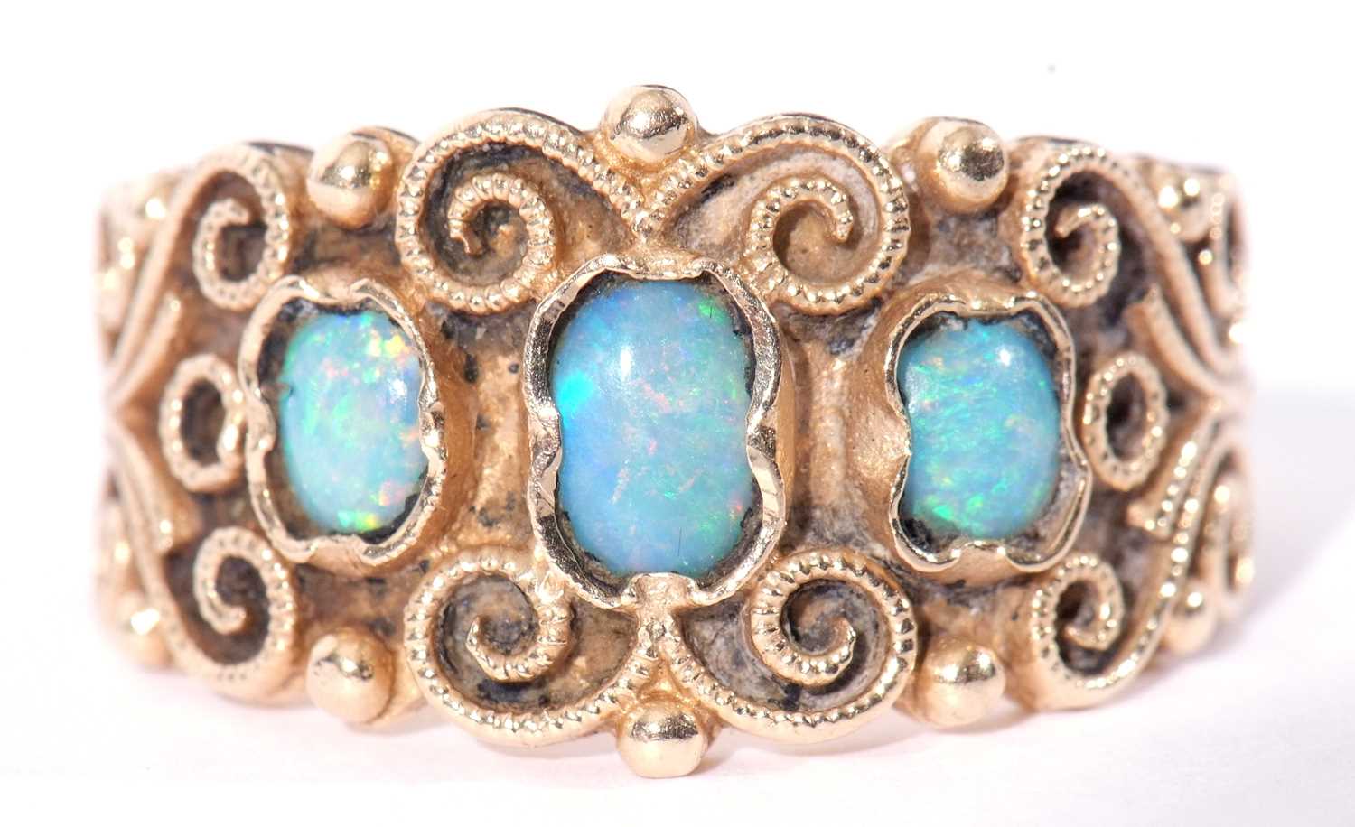 Opal three stone ring, the ornate filigree carved style gallery with three small graduated - Image 3 of 8