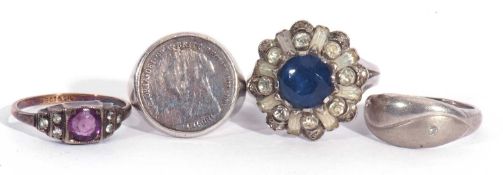 Mixed Lot: four white metal rings, a coin example, a blue stone, purple paste and one other