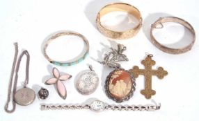 Small quantity of costume jewellery to include gold plated hinged bracelet, gilt metal cross,