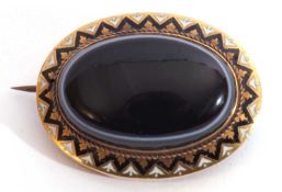 Victorian gold agate and enamel mourning brooch, the large oval shaped banded agate 26 x 12mm raised
