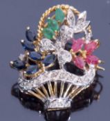 Precious gem set brooch, a basket of flowers design set with rubies, emeralds, sapphires and