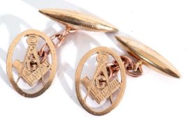 Pair of 9ct gold Masonic cuff links, the oval pierced plaques with ruler and divider symbol, chain
