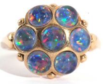 Modern 9ct gold opalescent cluster ring, a design featuring 7 round cabochon opalescents, marked '