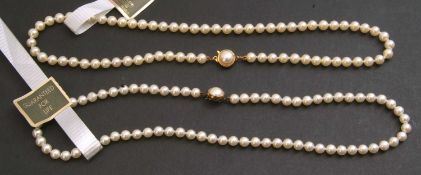 Two cased strings of simulated pearls, both 16ins long