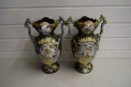 PAIR OF LATE 19TH/EARLY 20TH CENTURY CONTINENTAL DOUBLE HANDLED VASES DECORATED WITH FLOWERS