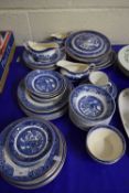 QUANTITY OF BLUE AND WHITE WILLOW PATTERN TABLE WARES