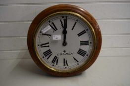 EARLY 20TH CENTURY CIRCULAR WALL CLOCK, THE FACE MARKED 'LONDON MADE IN ENGLAND'