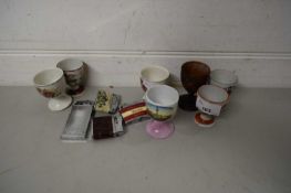 COLLECTION OF VARIOUS EGG CUPS AND VINTAGE CIGARETTE LIGHTERS