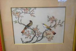 Pair of Oriental watercolours in gilt frames, one of pheasants, the other of birds on branches