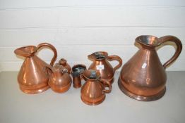 FOUR VARIOUS COPPER HAYSTACK MEASURES, TOGETHER WITH FOUR OTHER COPPER ITEMS (8)
