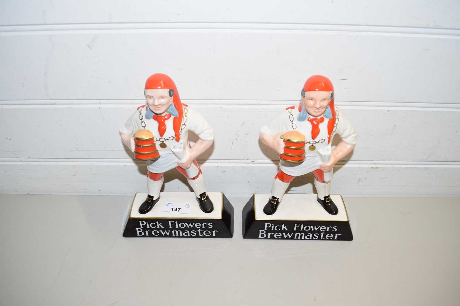 TWO CARLTON WARE BREWERY ADVERTISING FIGURES MARKED 'PICK FLOWERS BREWMASTER'