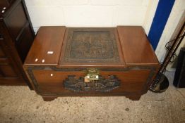 20TH CENTURY ORIENTAL BLANKET BOX WITH CARVED DECORATION