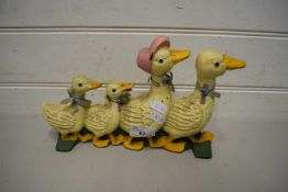 CAST IRON DOOR STOP FORMED AS A FAMILY OF DUCKS