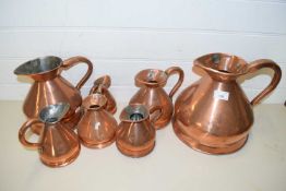SEVEN VARIOUS COPPER HAYSTACK MEASURES FROM 1 GALLON SIZE THROUGH TO 1 PINT