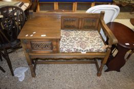OAK TELEPHONE SEAT WITH LINENFOLD DETAIL